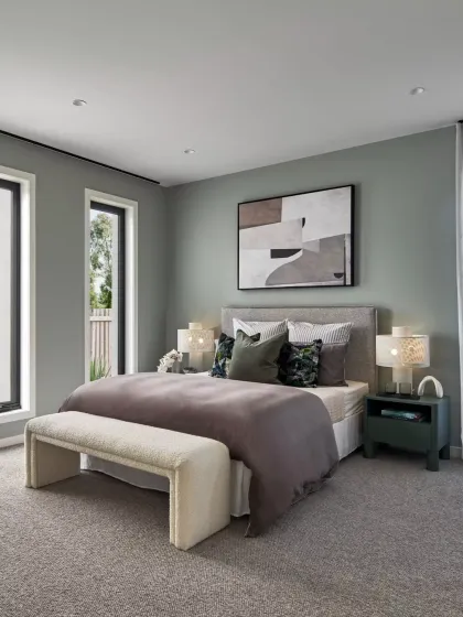 From our South Australia project, this bedroom embraces a muted sage green palette to foster tranquility. Layered textures, from the plush bedding to the boucle bench, create a cozy yet refined aesthetic.