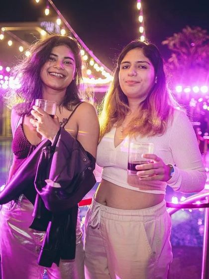 Guests enjoying the poolside vibes at the Taj MG Road during our NYE 2023 event. I love creating an atmosphere where everyone can relax and celebrate.