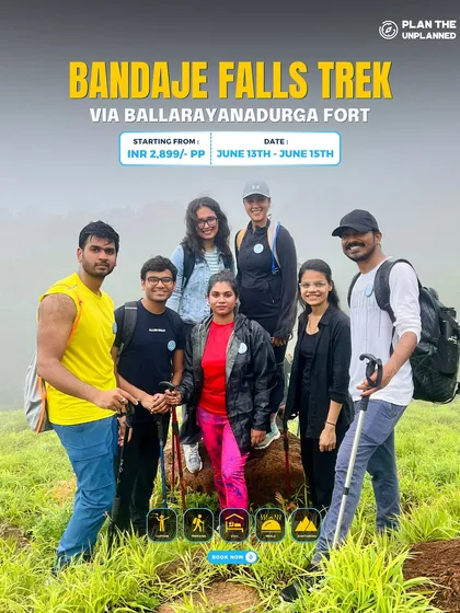 A group of friends on the Bandaje Falls trek, equipped with trekking poles.