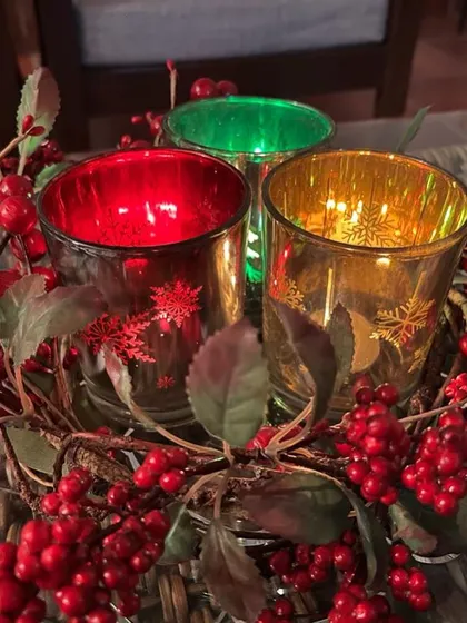 A client shared this photo of my red, green, and gold mercury glass holders, arranged in a beautiful Christmas wreath centerpiece.