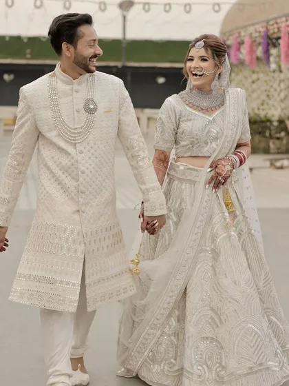 For the modern bride, an elegant white or ivory lehenga makes a stunning statement. Here, I created a soft, luminous makeup look that complements the intricate chikankari work, paired with a gentle smile that says it all.