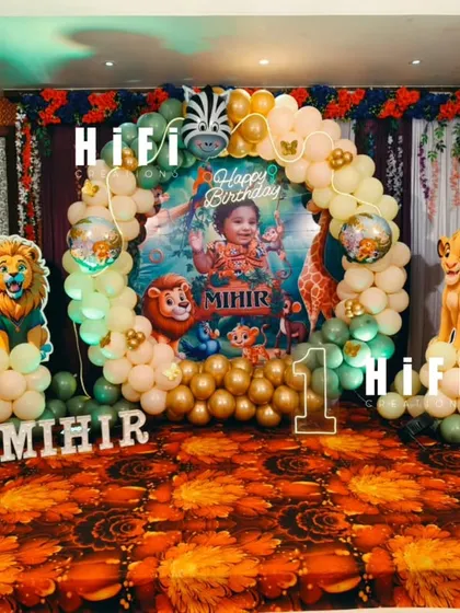 A closer look at our detailed Jungle Book and Lion King themed birthday decor. The setup features a custom backdrop with the birthday boy's photo, balloon arch, and character cutouts for a picture-perfect celebration.