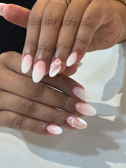 Our classic ombré nails are a popular choice. The soft gradient is elegant and perfect for any occasion.