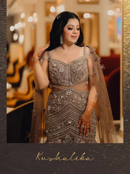 A solo portrait of the bride looking radiant in her embellished gown. We take the time to capture individual shots that showcase the bride's style and elegance during her evening celebration.