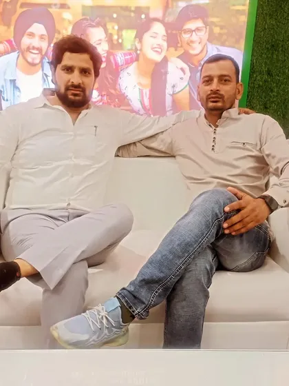 A friendly pose with a colleague, sharing the same philosophical thought about the dignity of complaints.