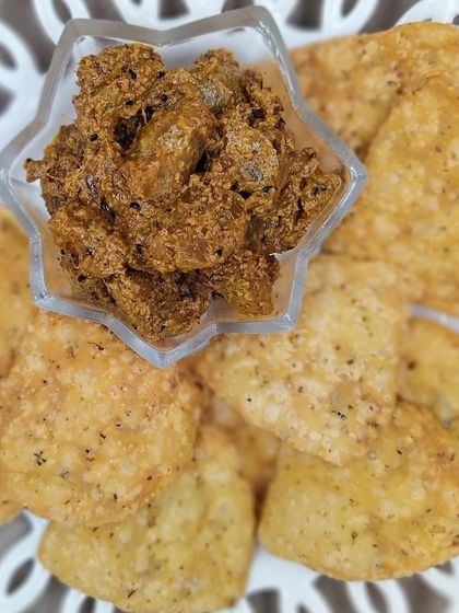 Amla ka Achaar served in a star-shaped bowl with mathri. It’s a lip-smacking combination that I highly recommend you try.