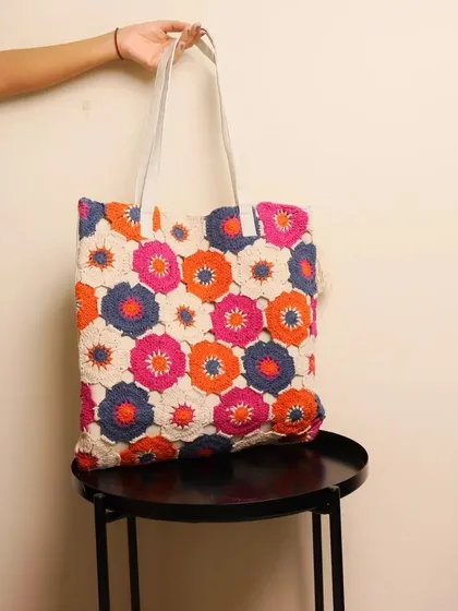 Here is a full view of the Bohemian tote, showing off its sturdy white straps and the cute little tassel I add for extra charm. It’s a handcrafted bag that is built to last and carry your essentials in style.