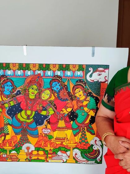 I am so happy to stand with my completed 'Parvati Alankaram' painting. This large 3x2 feet canvas tells the story of Princess Parvati preparing for her wedding to Lord Shiva, filled with lavish details and vibrant life.