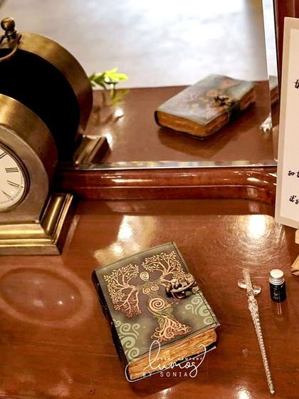 A close-up of the "Love Book" corner, where guests can write messages for the couple in a beautiful, vintage-style book.