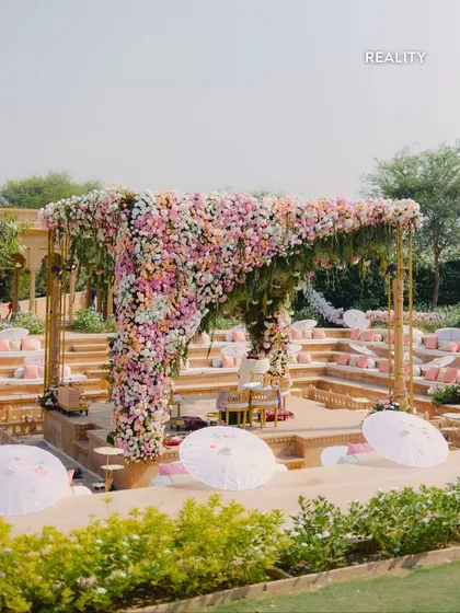 Reality: The final pastel mandap, a perfect mirror of our render. The soft blush and cream florals create a dreamy, romantic atmosphere, showing how we translate digital dreams into tangible beauty.