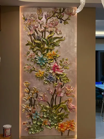A closer look at the floral mural, with backlighting that makes the pastel colors and gold accents glow.