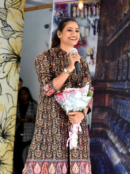 Receiving a bouquet as a thank you for being the distinguished dance judge at a college event. I love the energy and enthusiasm of student festivals.