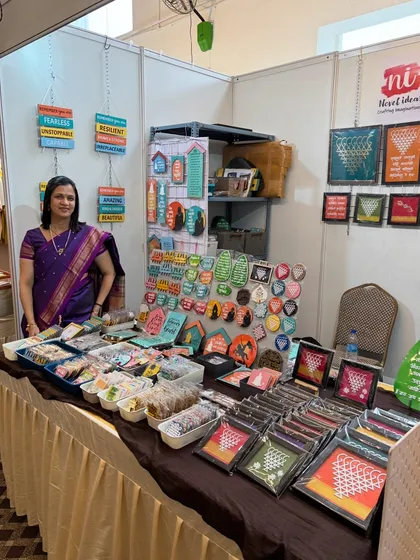 Another shot of my stall setup in Bangalore. You can see the wall hangings, frames, and magnets all ready for the exhibition.