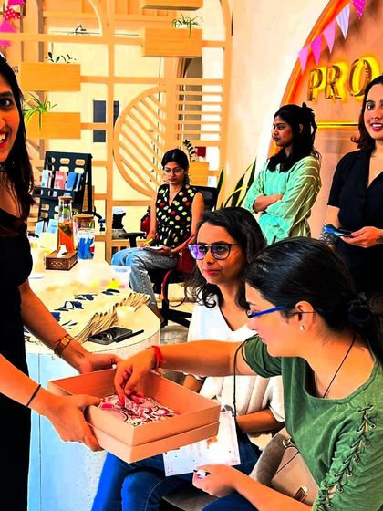 Participants engaging in an activity during our pleasure workshop. These events are interactive, fun, and designed to make you feel comfortable.