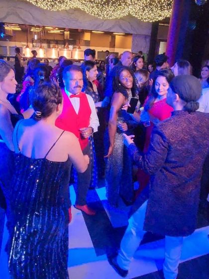 Me joining the guests on the dance floor. I believe in connecting with the crowd, not just playing for them. This interaction is key to keeping the energy alive.