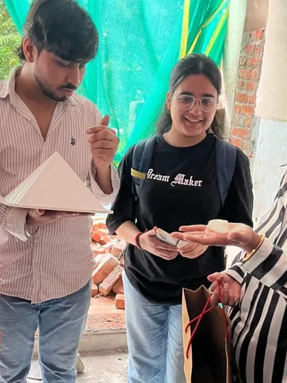 Practical learning is at the core of our interior design course. Our students are on-site, learning the principles of Vastu Shastra and how to apply remedies like pyramids to create harmonious living spaces.