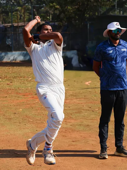 Our head coach observing a bowler's action during a match simulation. Every detail is analyzed to ensure technical perfection.