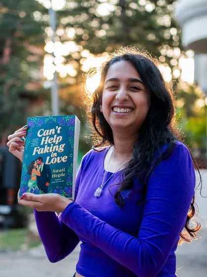 So happy to be holding my second romance novel, *Can't Help Faking in Love*. It's a story with *To All the Boys I've Loved Before* energy, but with a desi twist.