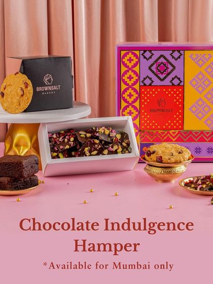 For the ultimate chocolate lovers, I created the Chocolate Indulgence Hamper for Diwali. It's filled with our decadent brownies, cookies, and chocolate barks. This special hamper is available exclusively for delivery within Mumbai.