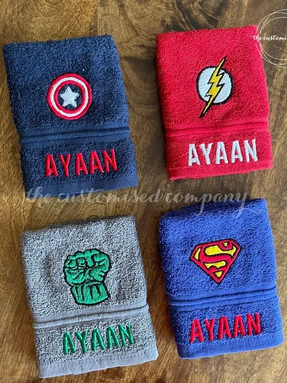 Unleash your little hero's dining adventures with our super-powered napkins. This set features embroidered logos of Superman, The Hulk, Captain America, and The Flash, all personalized with a name.
