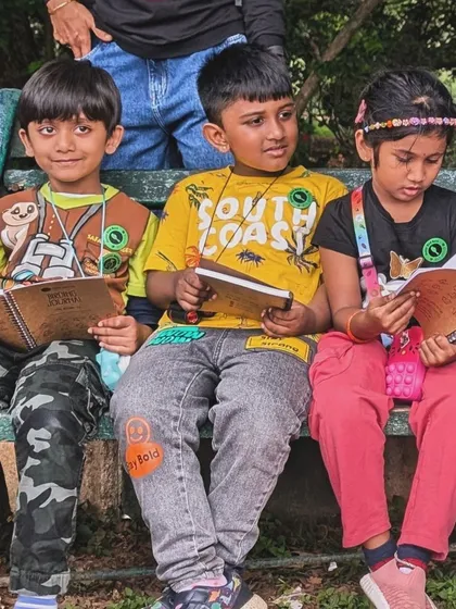 Our junior bird nerds, deeply engaged in their Birding Journals. These activity books are exclusively designed by us to encourage urban birdwatching.