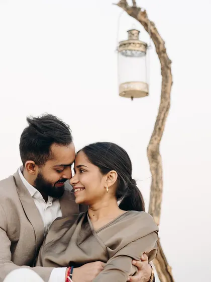 Another intimate moment from the desert shoot. The minimal makeup ensures the couple's natural connection is the focus of the photograph.
