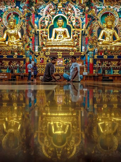 This photo from the Golden Monastery in Bylakuppe was taken during a pivotal time in my life. The reflections on the floor mirror the inner reflection I was engaged in, studying Ashtanga Yoga in Mysore and beginning my studies in Buddhism. The teachings of Lord Buddha have been a source of profound peace and clarity.