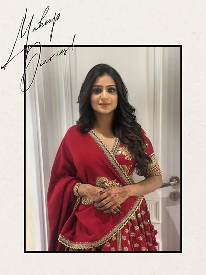 A full-length shot of the client in her beautiful red outfit, showing how her hair and makeup complete the entire look.