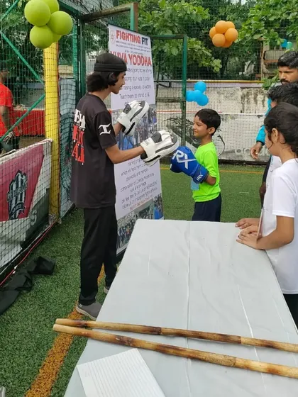 A young student gets ready to learn some basic boxing at our stall during the Bawa Juniorthon event. It's never too early to start learning self-awareness.