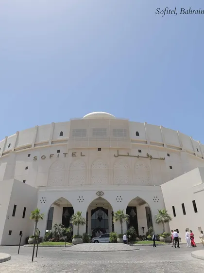 The magnificent facade of the Sofitel in Bahrain, a premier venue for luxury destination weddings. Its unique architecture provides a grand and unforgettable backdrop for any celebration.