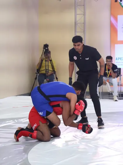 An action shot from the FMAAI Nationals, showing our fighter dominating on the ground. Our emphasis on integrated grappling pays off in the cage.