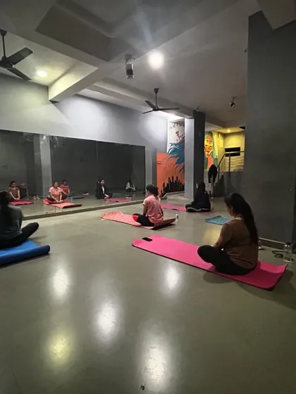 This is the end of a session, where we sit in quiet reflection. The calm, dimly lit atmosphere helps you absorb the benefits of your practice, leaving you feeling refreshed and centered.