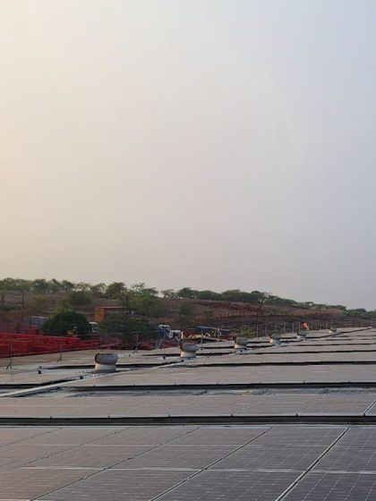 A view of the rooftop solar panels at the HCCB plant in Goa. Our on-site solutions are designed to withstand local environmental conditions while delivering optimal energy output for our clients.