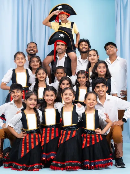 The happy faces of our pirate crew after a studio shoot for our annual recital. We believe dance is for everyone, and we love building a community of performers of all ages, from young children to adults.