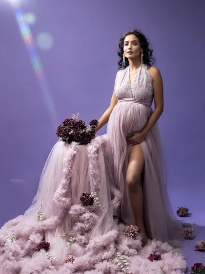Embracing a monochromatic lilac palette allows emotion to shine. This soft, dreamy, and ethereal setup creates a moment suspended in time.