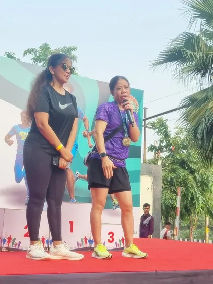 Mary Kom speaking to the audience at the UKG Unity Run. I provide a professional platform for guest speakers to deliver their message and inspire the participants.