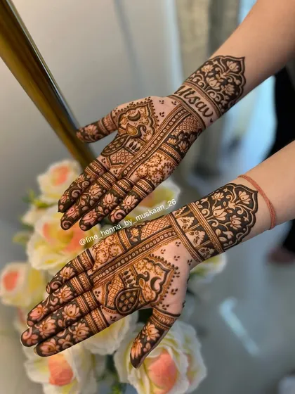 The front-hand view of the swan design, with the client's name "Utsav" beautifully written on the wrist.