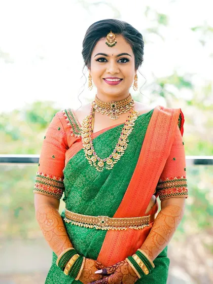 The smile of a happy bride. My goal is to make you feel comfortable and confident, and her expression says it all.