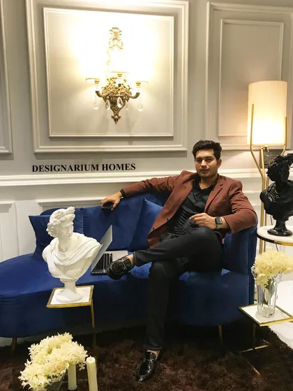 We believe a space should reflect your personal design language. Here I am in a recently completed project, where we combined neo-classical wall mouldings with bold, contemporary furniture like this blue velvet sofa. Our goal is to create environments that are not just beautiful, but also joyful and deeply personal.