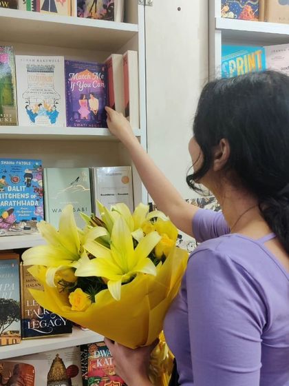 Placing my book on a shelf at a bookstore. A simple but incredibly meaningful moment for any author.