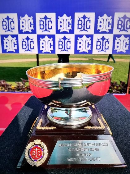 The gleaming gold-lined Garden City Trophy.