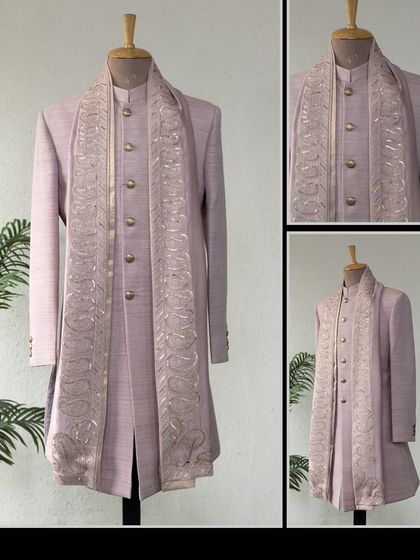 A classic Matka Silk Achkan in a soft lavender, paired with a paisley embroidered dupatta. A stylish and sophisticated choice for festive occasions.