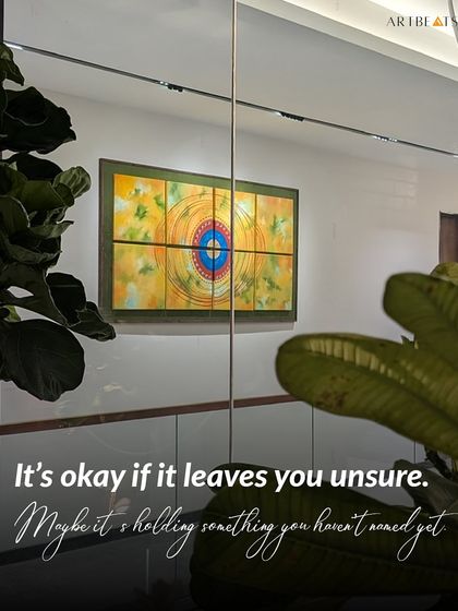 It is okay if an artwork leaves you unsure. Maybe it is holding something you have not named yet. This piece, 'Brahmaand', is seen here reflected in a client's space, holding its own energy.