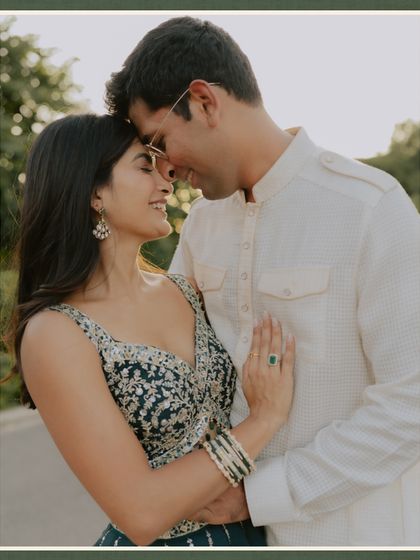 A close-up portrait filled with warmth and affection. The couple's gentle embrace and soft smiles are the focus, showcasing the deep connection at the heart of their heritage pre-wedding shoot.