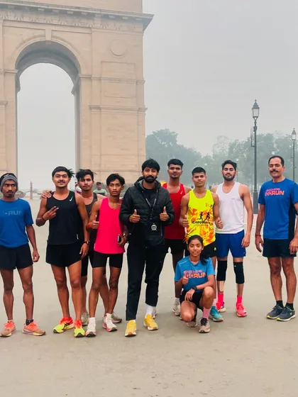 Another group shot with me and my athletes at India Gate. It's a moment to capture the success of a completed long run and the strong bond of our team.