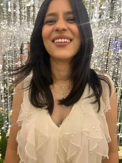 A happy, candid shot. At the end of the day, fashion is about feeling good and having fun, and that's the energy I bring to my clients.