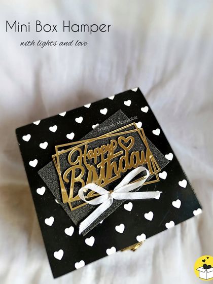 This mini box hamper is small but mighty. The heart-patterned box is perfect for a birthday surprise for your best friend.