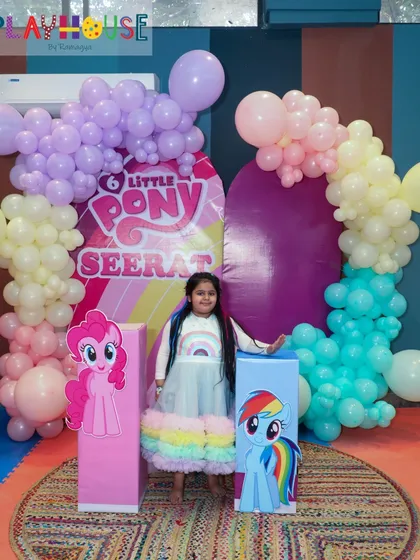 Seerat looks absolutely radiant at her "My Little Pony" themed party. The custom backdrop and her rainbow dress perfectly capture the colorful and joyful spirit of the celebration.