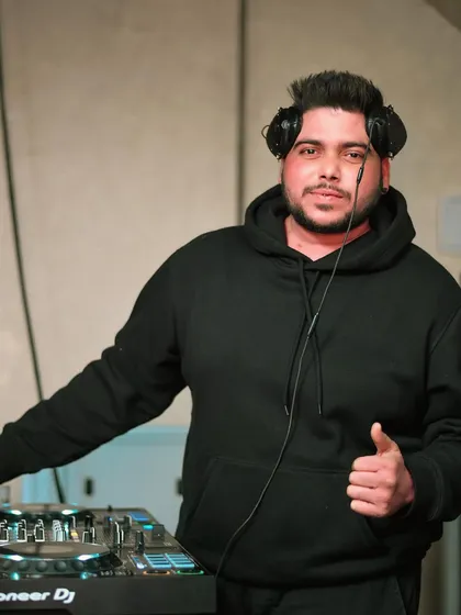 A simple, confident pose at the decks. Ready for whatever the night brings.