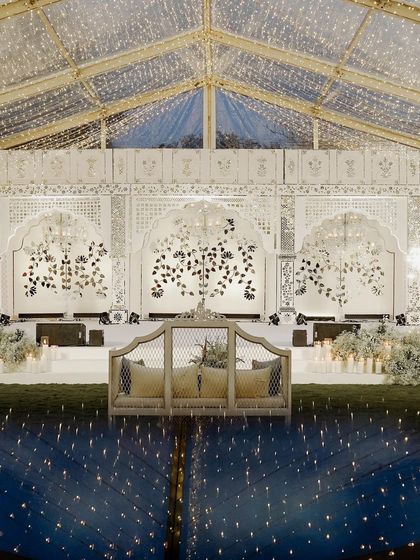 The central seating or 'gaddi' in front of the Thikri stage, offering the best view in the house. The design ensures that every element, from seating to stage, is part of a cohesive and beautiful story.